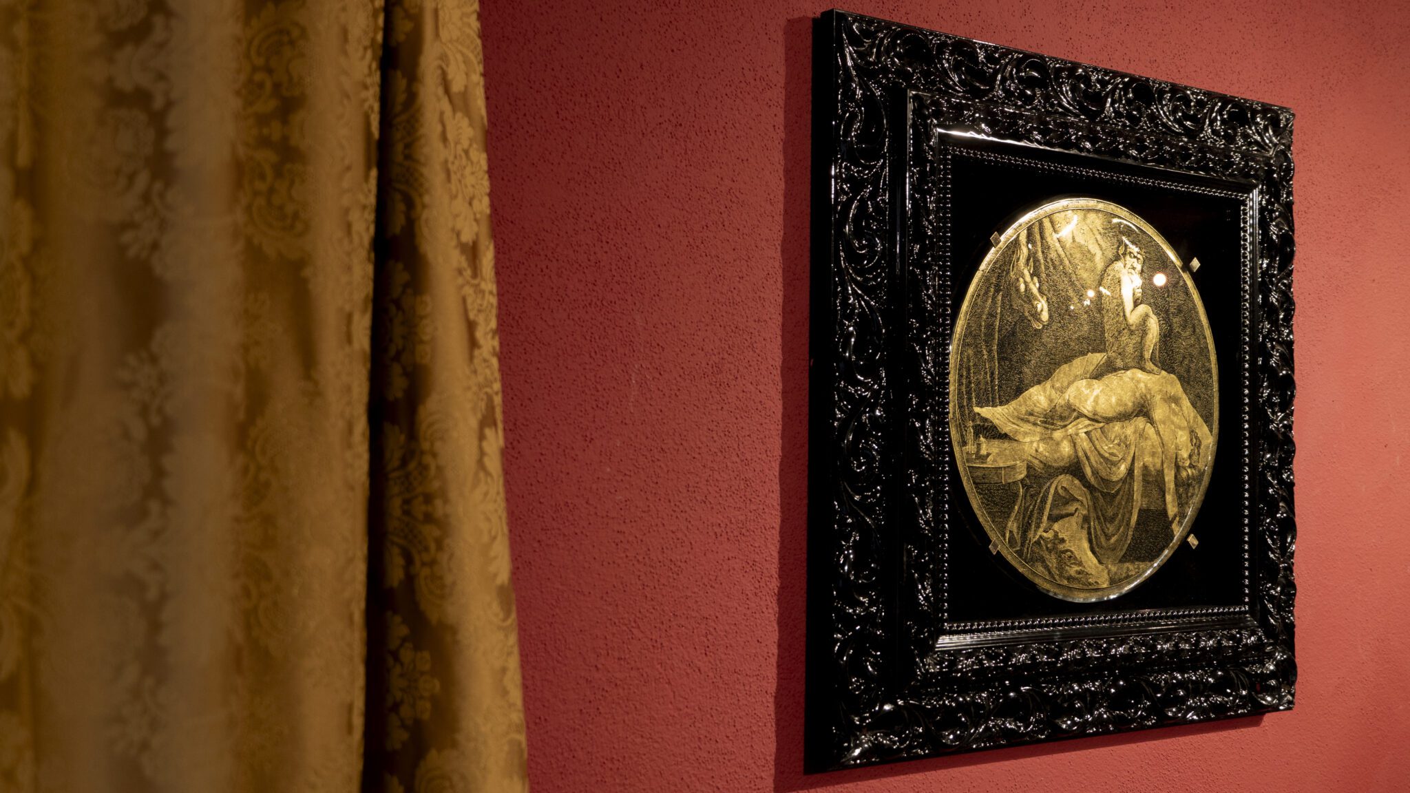 Murano glass and 24-karat gold leaf artwork by Riccardo Toso Borella: a reclining female figure inspired by Europa lies in a dreamlike scene while a small monster sits on her abdomen and an infernal horse emerges from behind a curtain bearing the European Union flag.